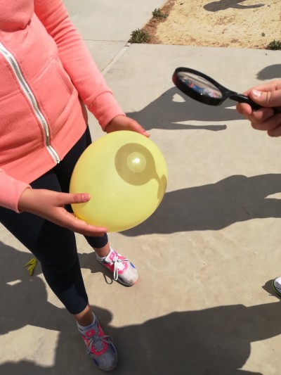 The sun made the black balloon to boom very soon.